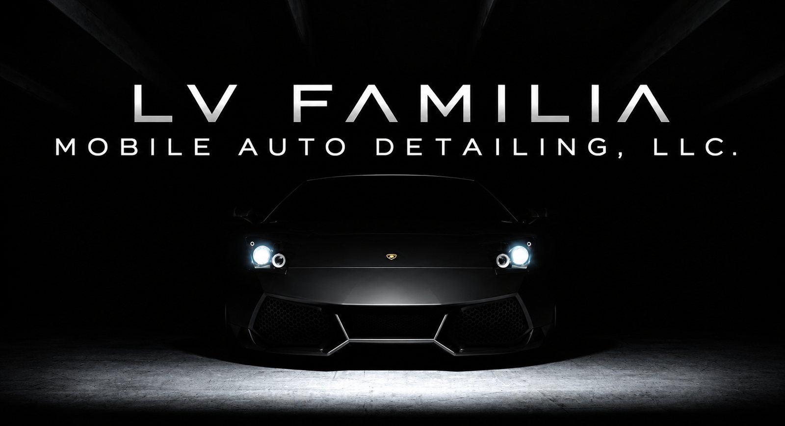 LV Familia Mobile Auto Detailing, LLC. over a dark showroom scene with a sports car and glowing headlights